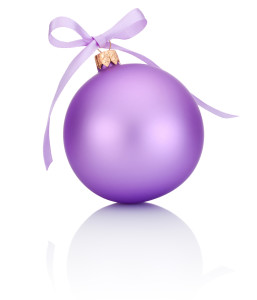 Purple Christmas ball with ribbon bow Isolated on white background